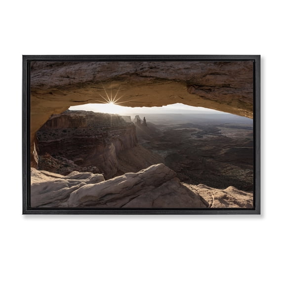 Stupell Industries Peeking Through Desert Arch Landscape & Nature Photography Black Floater Framed Canvas Art Print Wall Art, 25 x 17