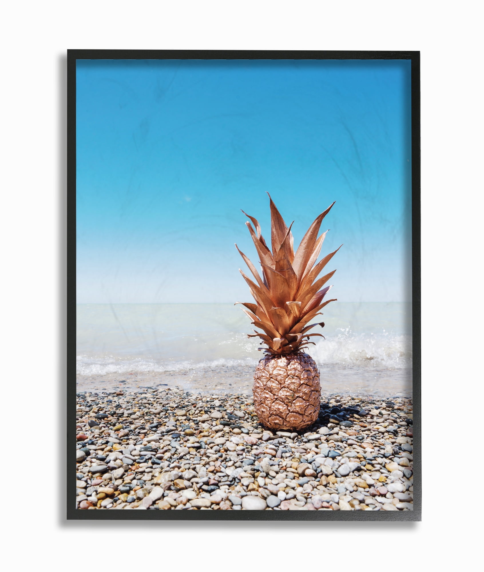 Stupell Industries Rose Gold Metallic Pineapple On Beach with Blue Sky Landscape Photography Black Framed Art Print Wall Art, 16 x 20