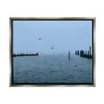 thumbnail image 1 of Stupell Industries Seagulls Over Ocean Dock Waters Coastal Photography Gray Floater Framed Art Print Wall Art, 1 of 6