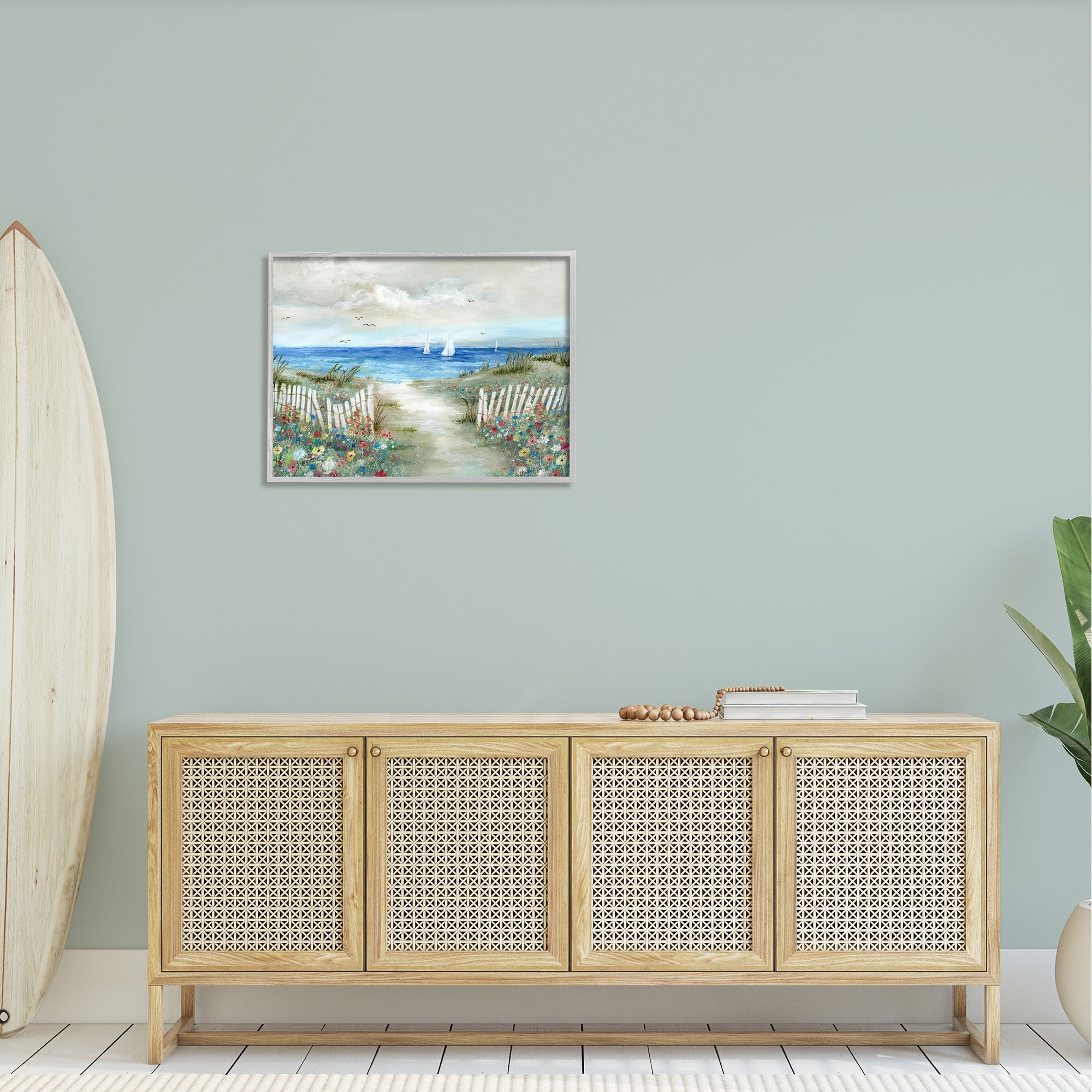 Stupell Industries Tranquil Beachside Flower Meadow Ocean Sailboats Scene Painting Gray Framed Art Print Wall Art, Design by Nan