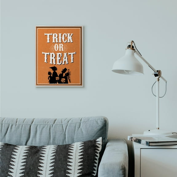 Stupell Industries Trick Or Treat Orange White Cartoon Holiday Word Design Graphic Art Gray Framed Art Print Wall Art, 16x20, by The Saturday Evening Post
