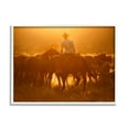 thumbnail image 1 of Stupell Industries Warm Sunlit Cowboy Riding Horse Rural Ranch Photograph White Framed Art Print Wall Art, Design by Lisa Dearing, 1 of 7