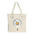thumbnail image 1 of Stylish Canvas Tote Bag featuring a large white flower with blue accents a small figure and birds perfect for shopping and travel, 1 of 4