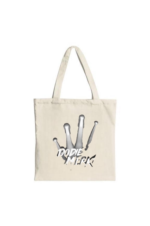 Stylish Cream Canvas Tote Bag with Cut - Out Hand Graphic & Bold ' DODIE MERK ' Text - Perfect for Shopping Travel & Parties