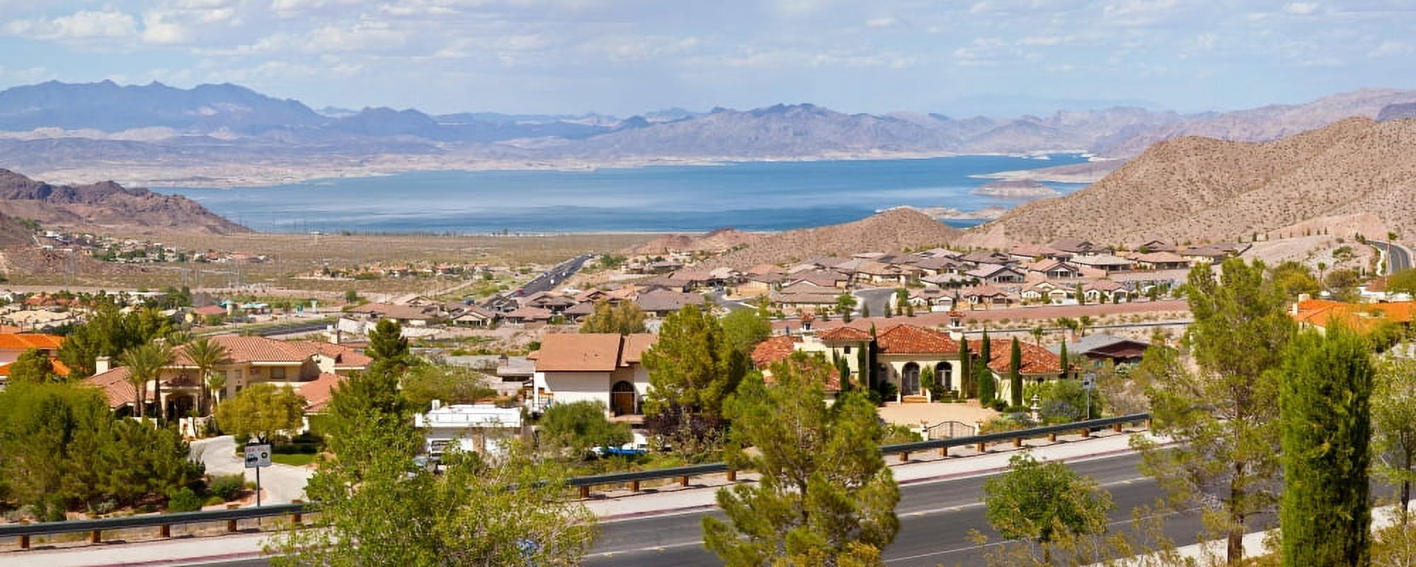 Suburbs and Lake Mead with surrounding mountains in background Boulder City Clark County Nevada USA Canvas Art - Panoramic Images (27 x 9)