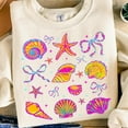 thumbnail image 1 of Summer Clam Coquette T-Shirt, Pink Bow Beach Tee, Retro Summer Vibes Shirt, Cute Coastal Outfit, Trendy Girly Summer T-Shirt, 1 of 5