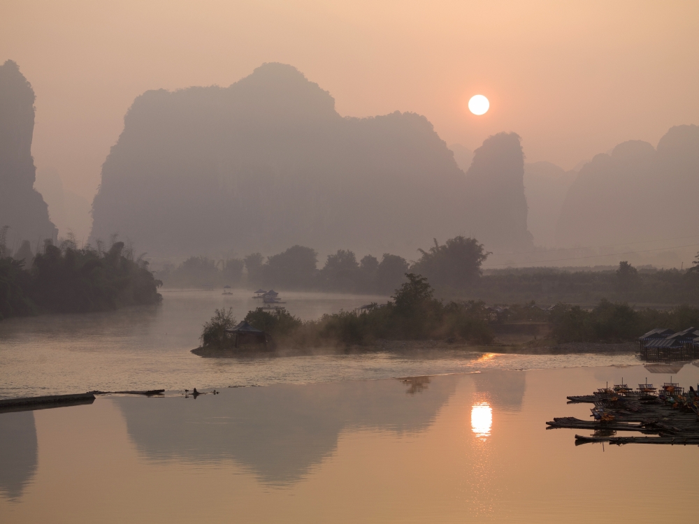 Sun In The Haze Above The Mountains Yangshou Guangxi China Canvas Art - Keith Levit Design Pics (20 x 15)