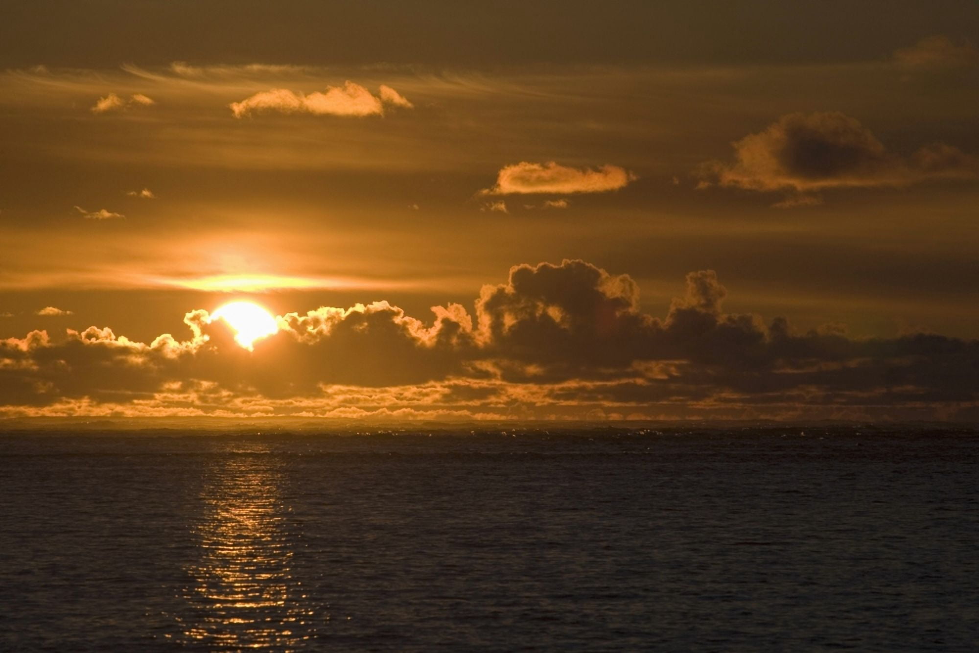 Sun Setting On The Ocean With The Sunlight Reflecting On The Water Lincoln City Oregon United States of America Canvas Art - Michael Interisano Design Pics (38 x 24)