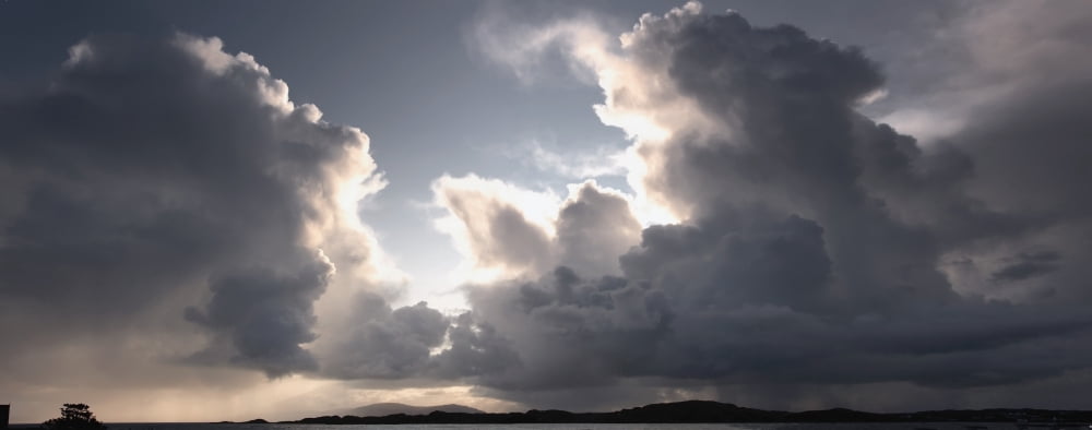 Sun Through Breaking Clouds Canvas Art - John Short Design Pics (31 x 12)