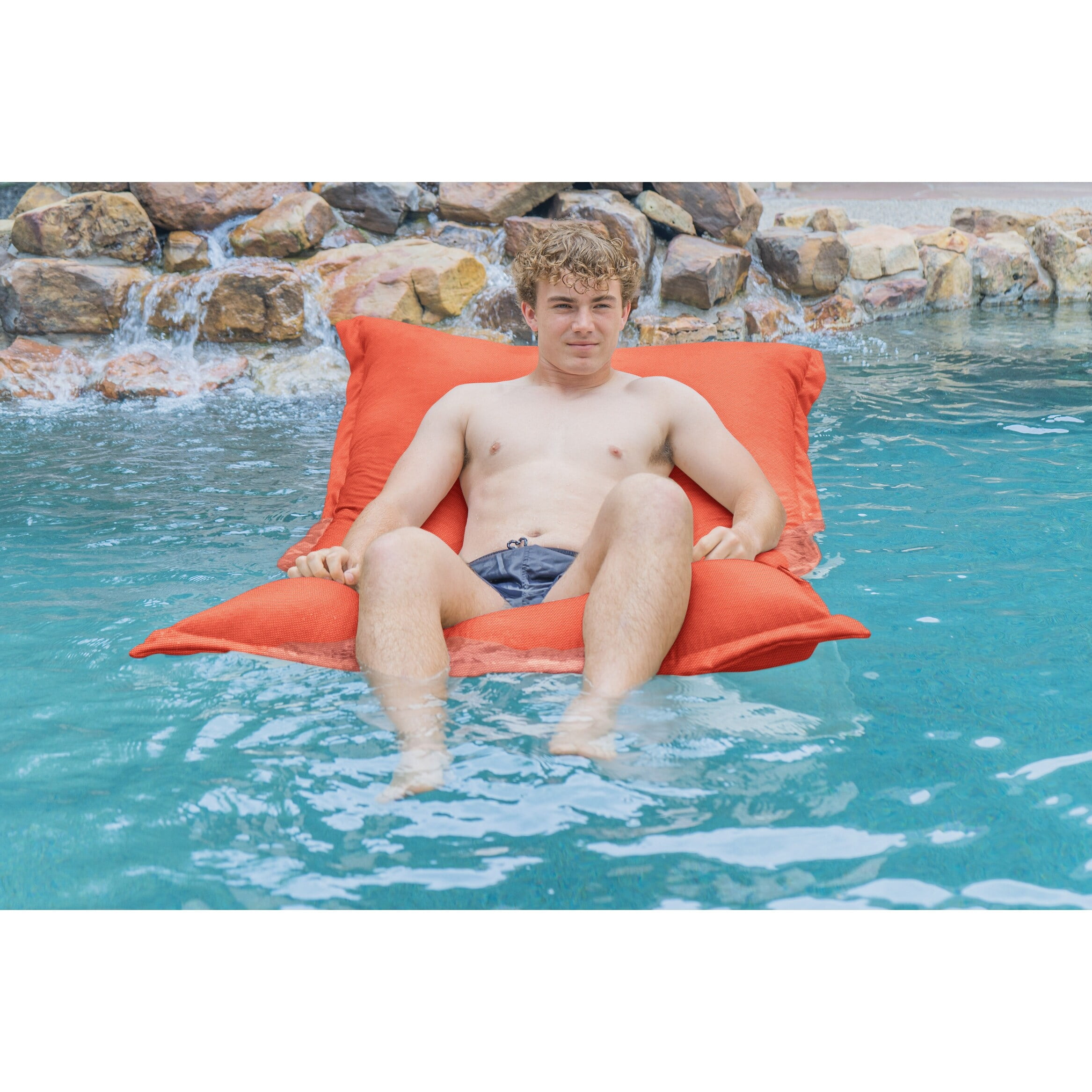 Sunbrella Sorra Home Outdoor Pool Float 64 in x 42 in x 7 in Canvas Melon