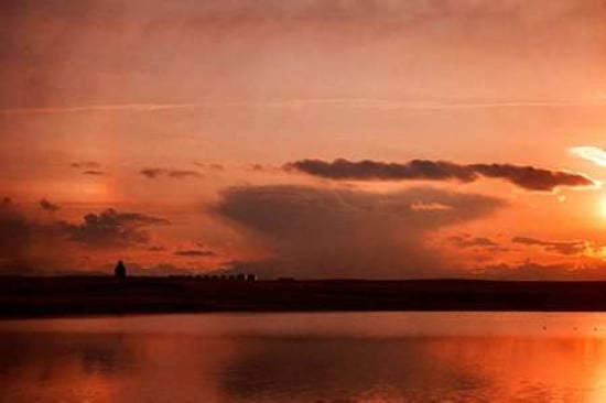 Sundogs and Storm Clouds Canvas Art - Roberta Murray (12 x 18)