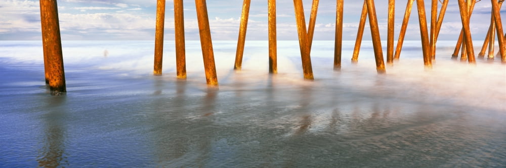 Sunlight falling on pilings of the Rosarito Beach Pier Rosarito Beach Baja California Mexico Canvas Art - Panoramic Images (36 x 12)