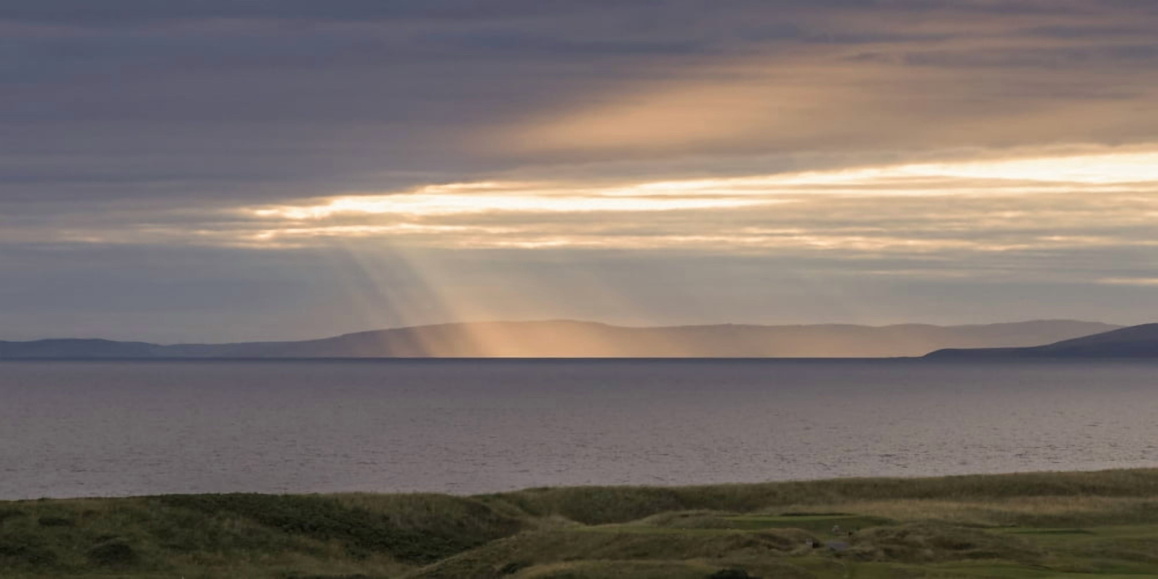 Sunlight shining through clouds onto the coastline Turnery Scotland Canvas Art - Keith Levit Design Pics (44 x 22)