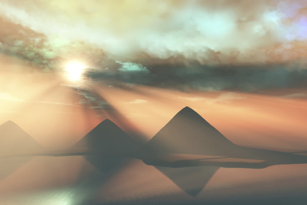 Sunrays shine down on three pyramids along the Nile River on the Giza Plateau Canvas Art - Corey FordStocktrek Images (35 x 23)