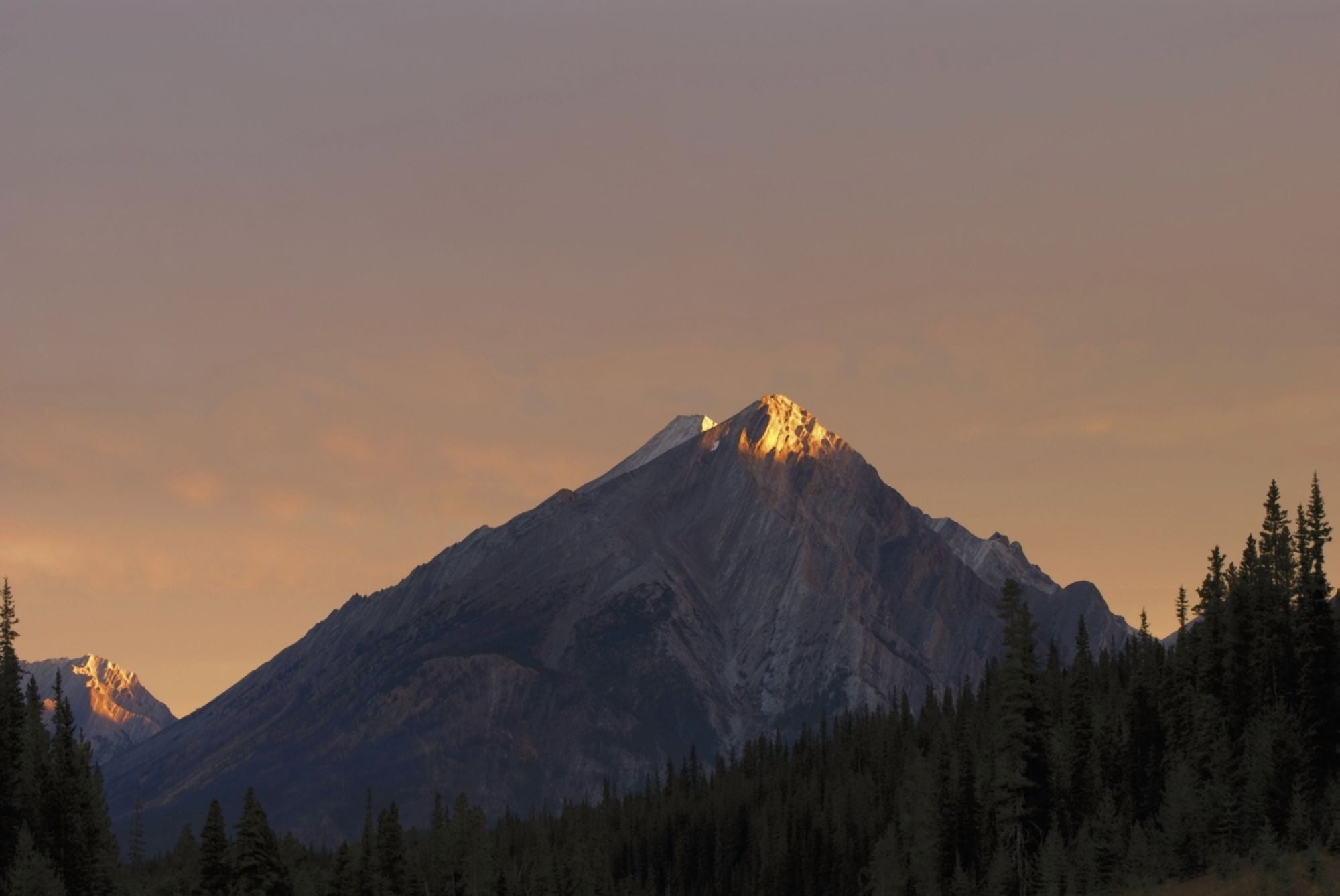 Sunrise Lights Up A Mountain Peak Alberta Canada Canvas Art - Philippe Widling Design Pics (38 x 24)