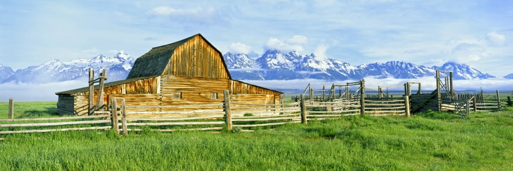 Sunrise over the Moulton Barn along Mormon Row Teton Range Mormon Row Historic District Grand Teton National Park Wyoming USA Canvas Art - Panoramic Images (27 x 9)