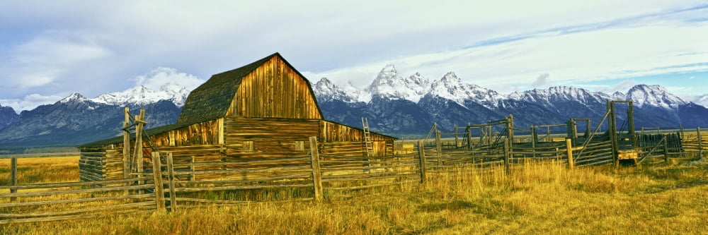 Sunrise over the Moulton Barn along Mormon Row Teton Range Mormon Row Historic District Grand Teton National Park Wyoming USA Canvas Art - Panoramic Images (36 x 12)