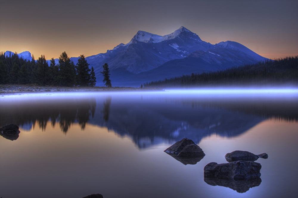 Sunrise On A Foggy Maligne Lake In Jasper National Park Alberta Canvas Art - Dan Jurak Design Pics (34 x 22)