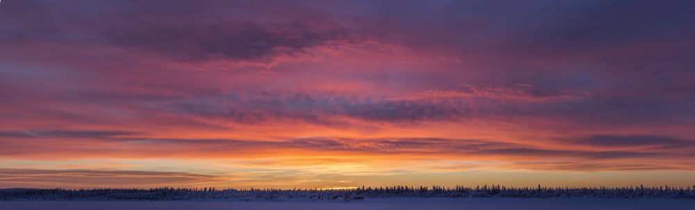Sunrise clouds over the Porcupine River Old Crow Yukon Canada Canvas Art - Robert Postma Design Pics (44 x 13)