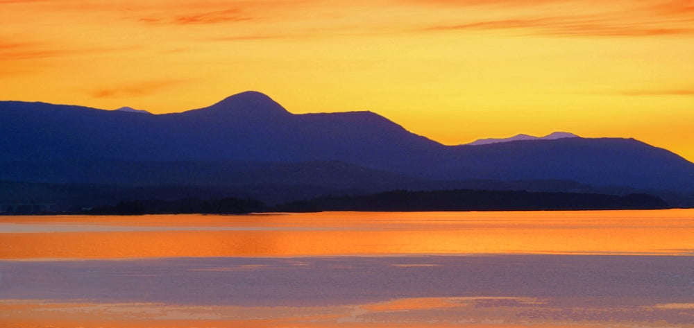 Sunset And Mountain Silhouette Canvas Art - Raven Regan Design Pics (20 x 9)