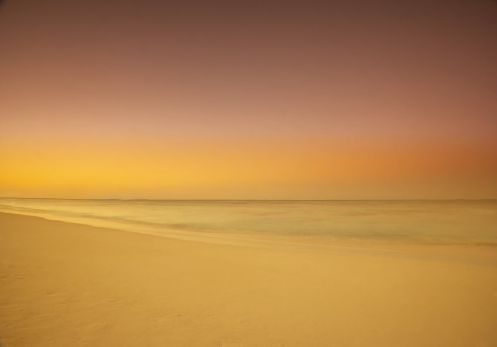 Sunset On Cable Beach Nassau Bahamas Canvas Art - Geoff George Design Pics (34 x 24)