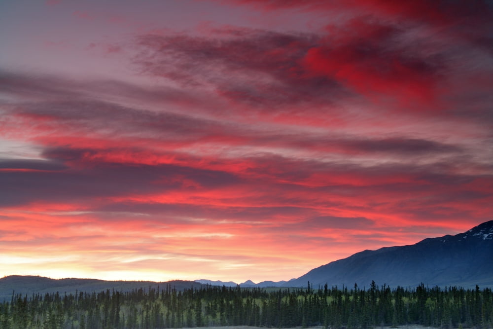 Sunset Over Mountains Along The Alaska Highway Outside Whitehorse Yukon Canvas Art - Robert Postma Design Pics (18 x 12)