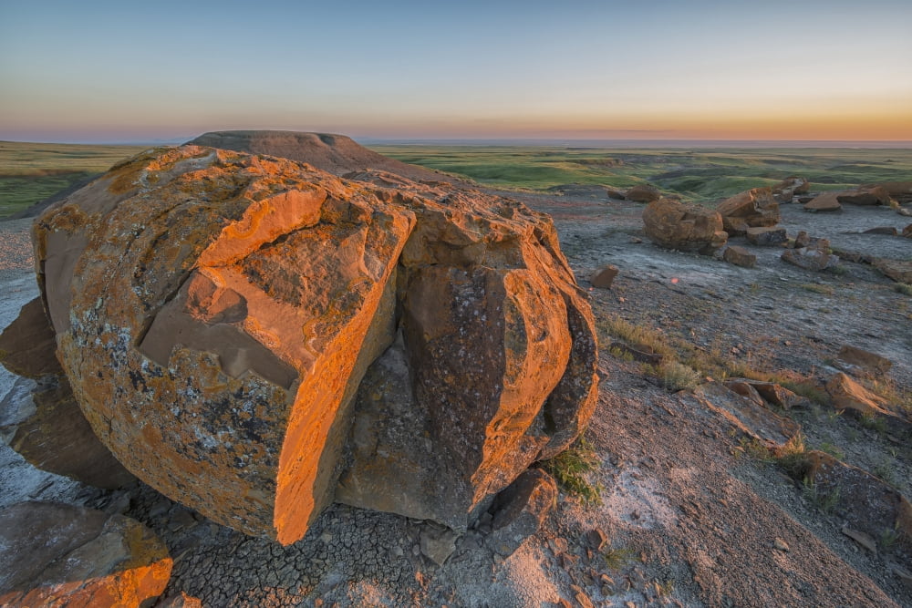 Sunset Over The Rocks At Red Rock Coulee Alberta Canada Canvas Art - Robert Postma Design Pics (38 x 24)