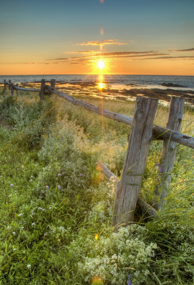 Sunset Over Water And A Fence Along The Shoreline La Martre Quebec Canada Canvas Art - Philippe Widling Design Pics (12 x 18)