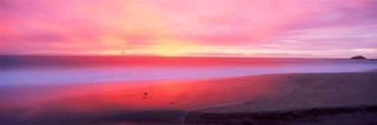 Sunset light painting waves across sandy shore on beach Laguna Beach California USA Canvas Art - Panoramic Images (36 x 12)