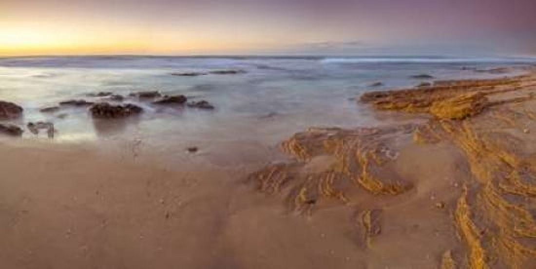 Sunset on rocky beach with colorful sky Canvas Art - Assaf Frank (24 x 48)