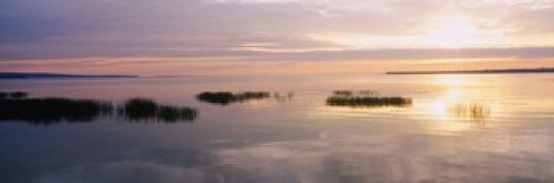 Sunset over a lake Chequamegon Bay Lake Superior Wisconsin USA Canvas Art - Panoramic Images (18 x 6)
