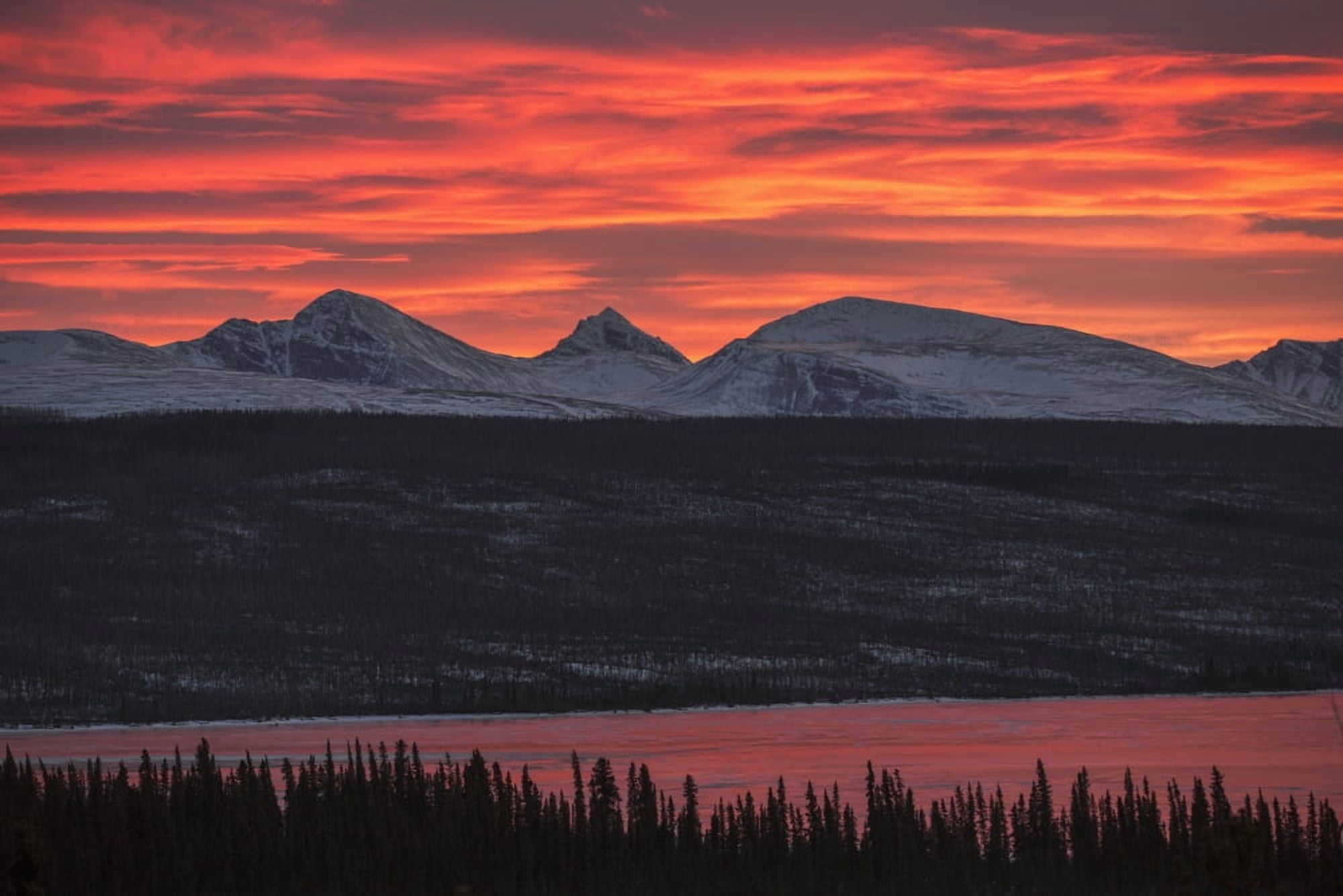 Sunset over the Rancheria Range of mountains and the ice covered Swan Lake Yukon Canada Canvas Art - Robert Postma Design Pics (19 x 12)