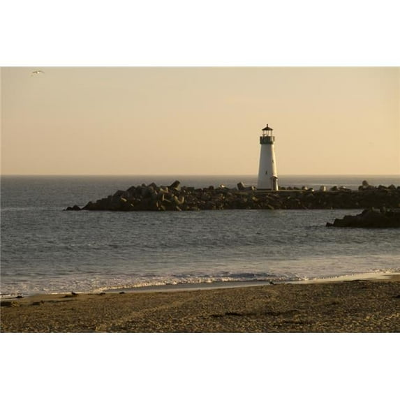 Sunset over the Walton Lighthouse at the Santa Cruz Harbor and Monterey Bay; California United States of America 19 x 12