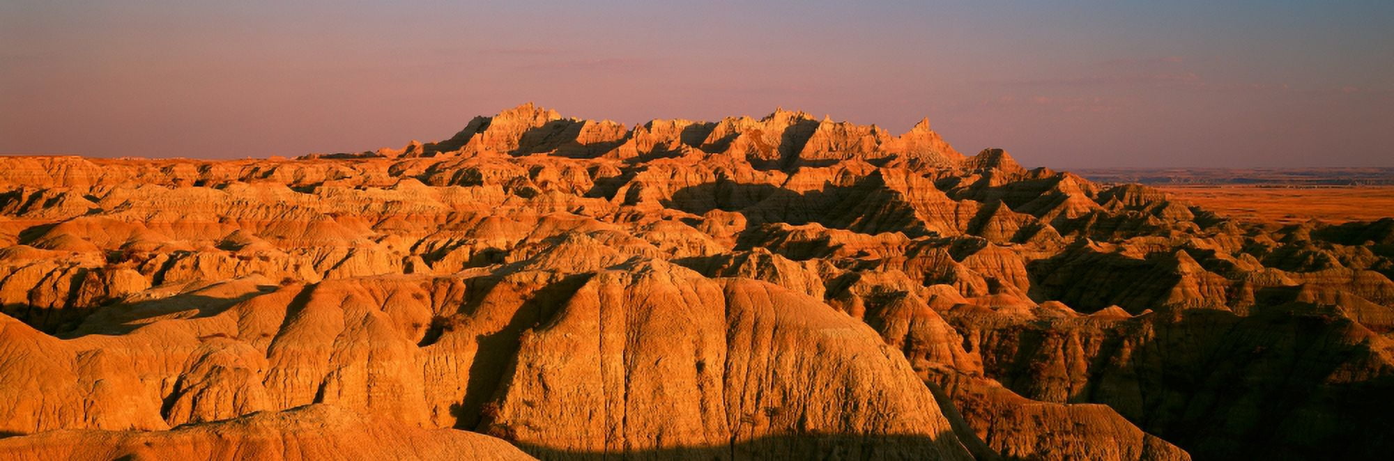 Sunset panoramic view of mountains in Badlands National Park in South Dakota Canvas Art - Panoramic Images (27 x 9)