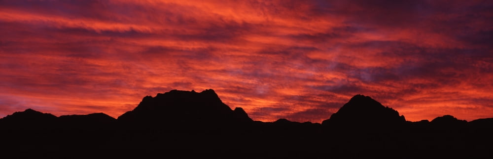 Sunset silhouette mountain range NV USA Canvas Art - Panoramic Images (36 x 12)