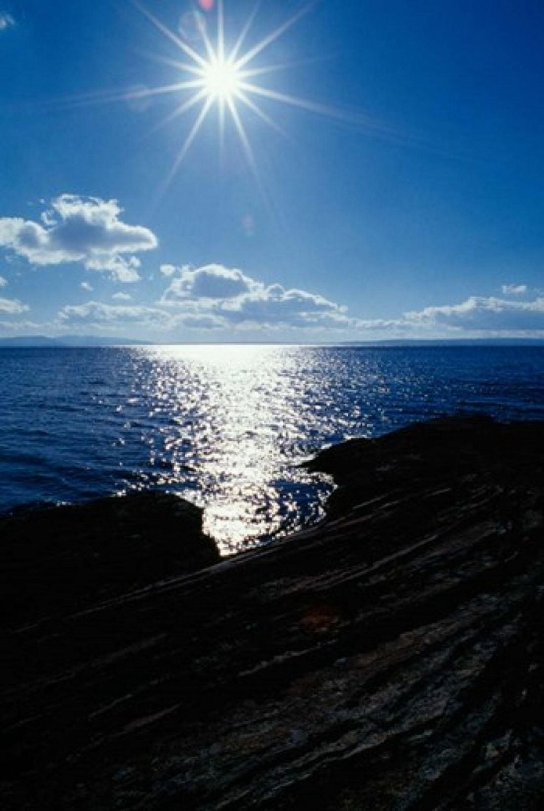 Sunstar Over Yellowstone Lake Canvas Art - Panoramic Images (12 x 18)
