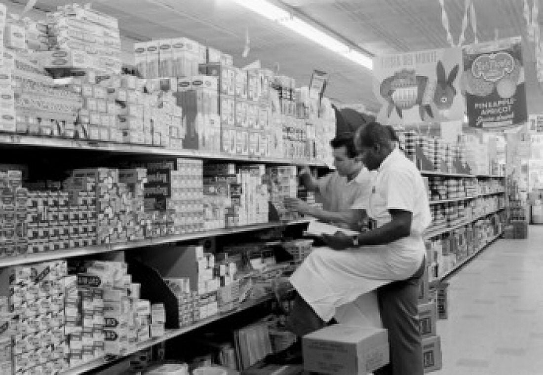 Super market clerks taking inventory Canvas Art - (24 x 36)