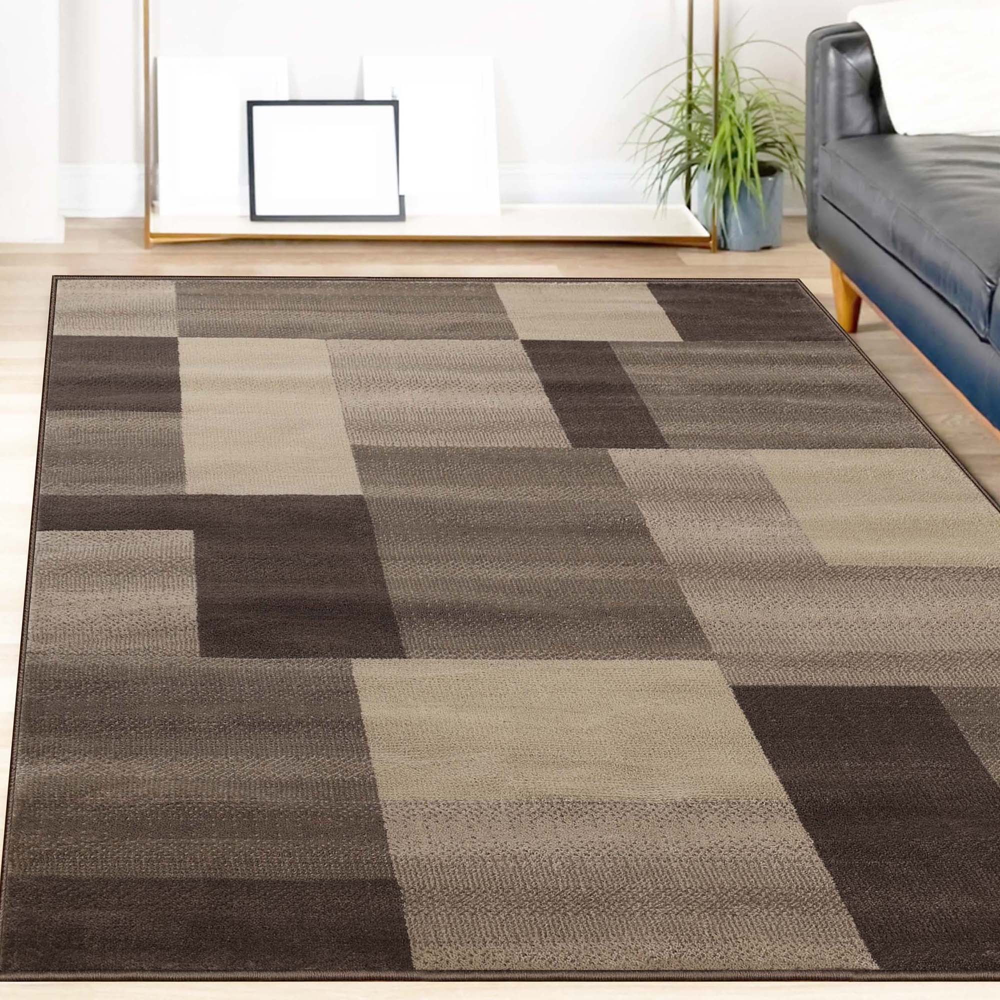 Beige Geometric Patchwork 6' x 9' Synthetic Area Rug