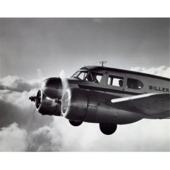 Superstock SAL2553561 Low Angle View of An Aircraft in Flight Twin Engine Cessna Poster Print, 18 x 24