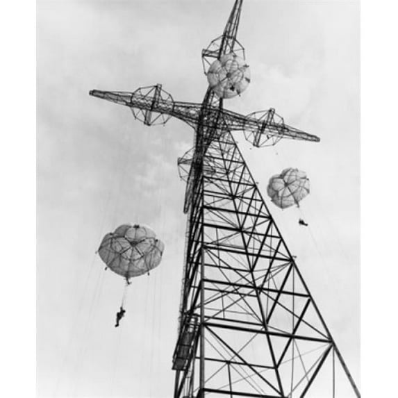 Superstock SAL25543821 Low Angle View of Army Soldiers Parachuting From A Tower At A Training Center Fort Benning South Georgia USA 24 September 1949 Poster Print, 18 x 24