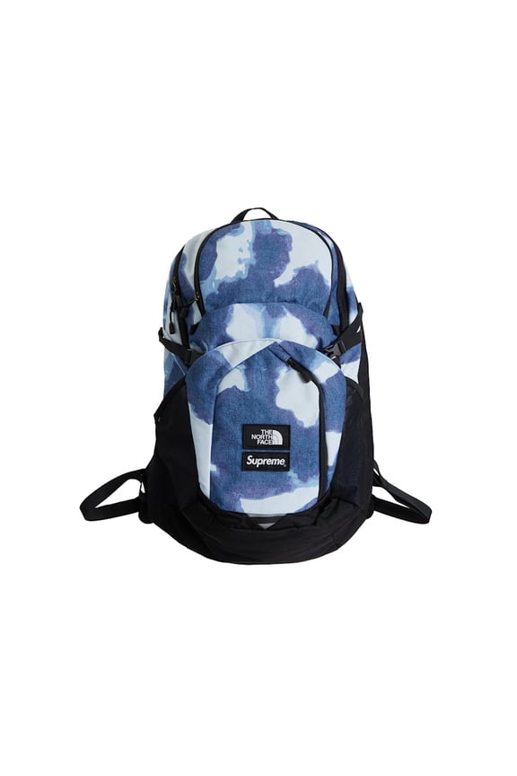 The North Face Bleached Denim Print Pocono Backpack, from StockX