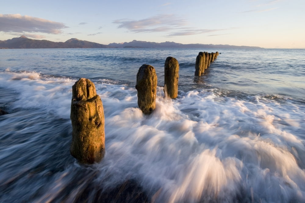 Surf Rushing Around Old Pilings Along Beach Homer Spit Kachemak Bay Alaska Summer Evening Blur Motion Canvas Art - Scott Dickerson Design Pics (34 x 22)