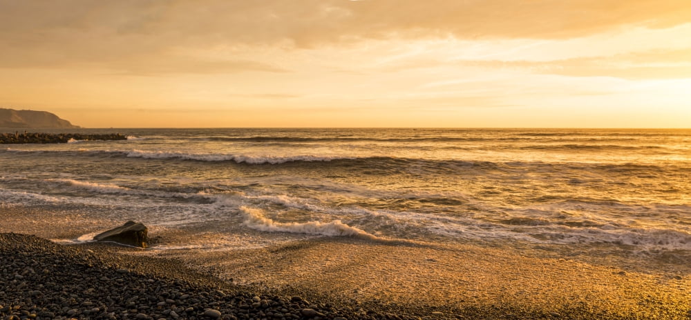 Surf on beach at dusk Playa Waikiki Miraflores District Lima Peru Canvas Art - Panoramic Images (27 x 9)