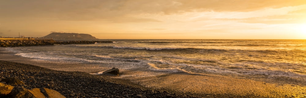 Surf on beach at dusk Playa Waikiki Miraflores District Lima Peru Canvas Art - Panoramic Images (36 x 12)