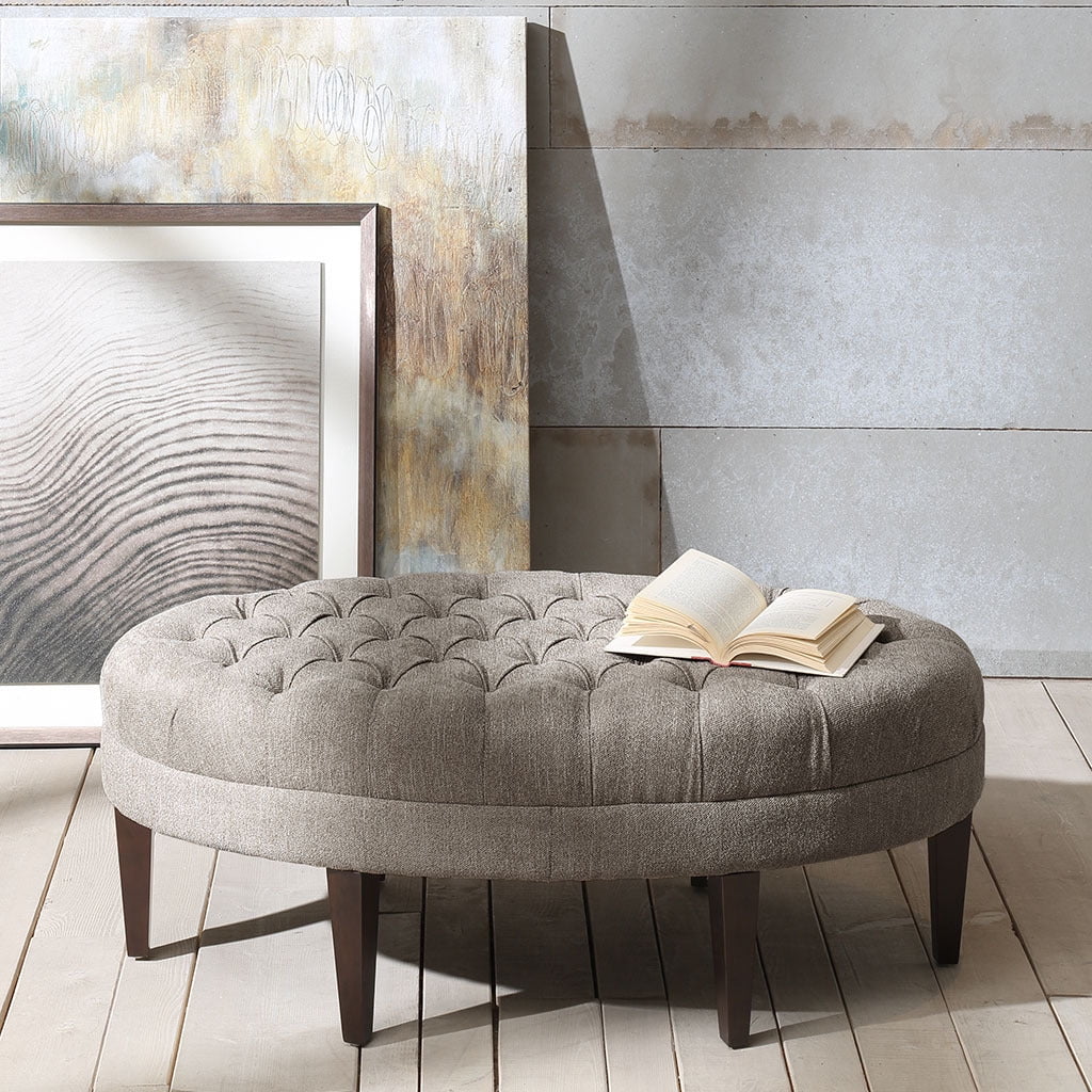 Beige Tufted Oval Ottoman with Dark Wood Legs
