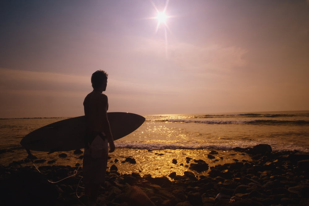 Surfer At The End Of The Day On The Beach Canvas Art - Darren Greenwood Design Pics (34 x 22)