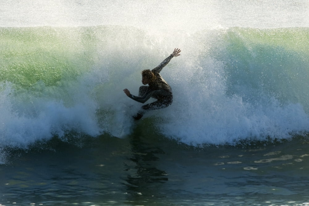 Surfer Catching A Wave Canvas Art - Ben Welsh Design Pics (34 x 22)