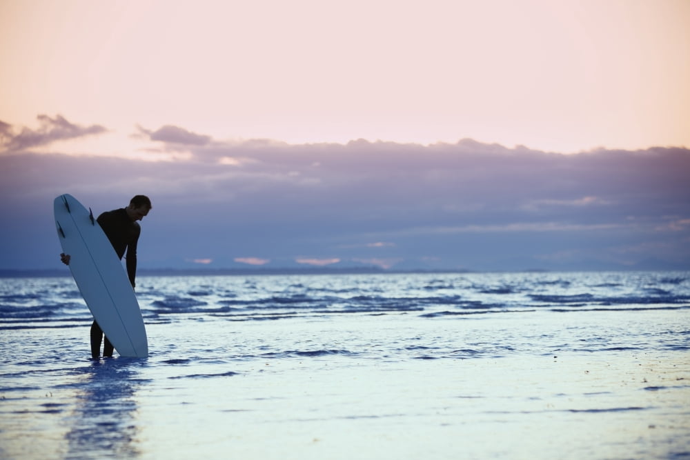 Surfer In The Shallow Water Canvas Art - Daniel Sicolo Design Pics (17 x 11)