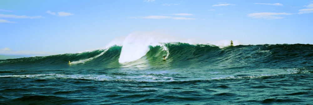 Surfer surfing in the ocean Oahu Hawaii USA Canvas Art - Panoramic Images (27 x 9)