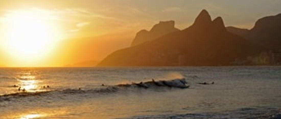 Surfers at sunset on Ipanema Beach Rio De Janeiro Brazil Canvas Art - Panoramic Images (15 x 6)